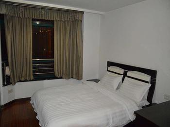 Yangguang Xingzuo Apartment Hotel Chongqing Esterno foto