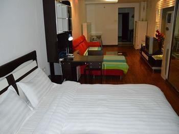 Yangguang Xingzuo Apartment Hotel Chongqing Esterno foto